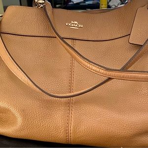 Coach tan medium handbag in excellent condition.